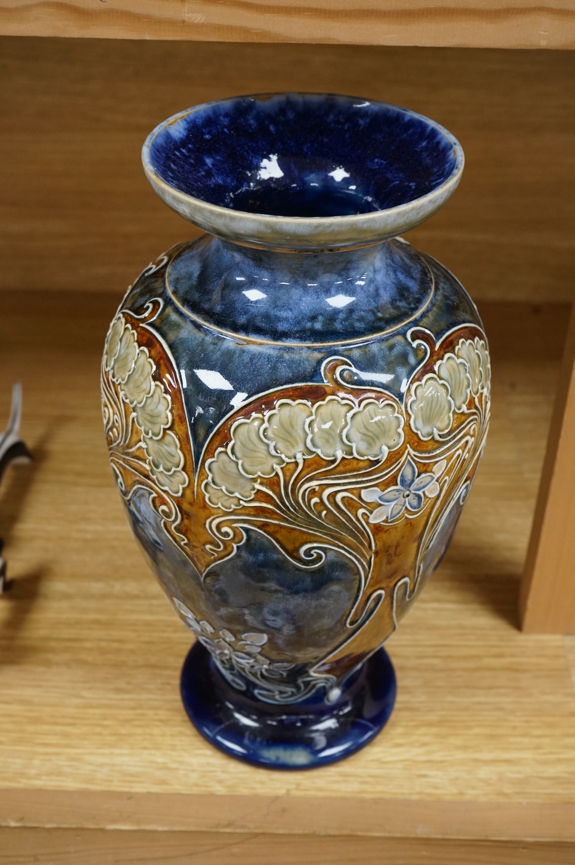 A Doulton Lambeth vase by Eliza Simmance, with repaired foot, 28cm high